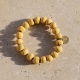Bracelet en perles d’argile émaillée unisexe - Simbi - Haïti © Cécile Chabert