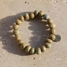 Bracelet en perles d’argile d'Haïti émaillée mate kaki unisexe - Simbi