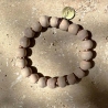 Bracelet artisanal en perles d’argile émaillée beige rosé - Simbi Haïti