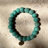 Bracelet artisanal en perles d’argile émaillée vert jade - Simbi Haïti